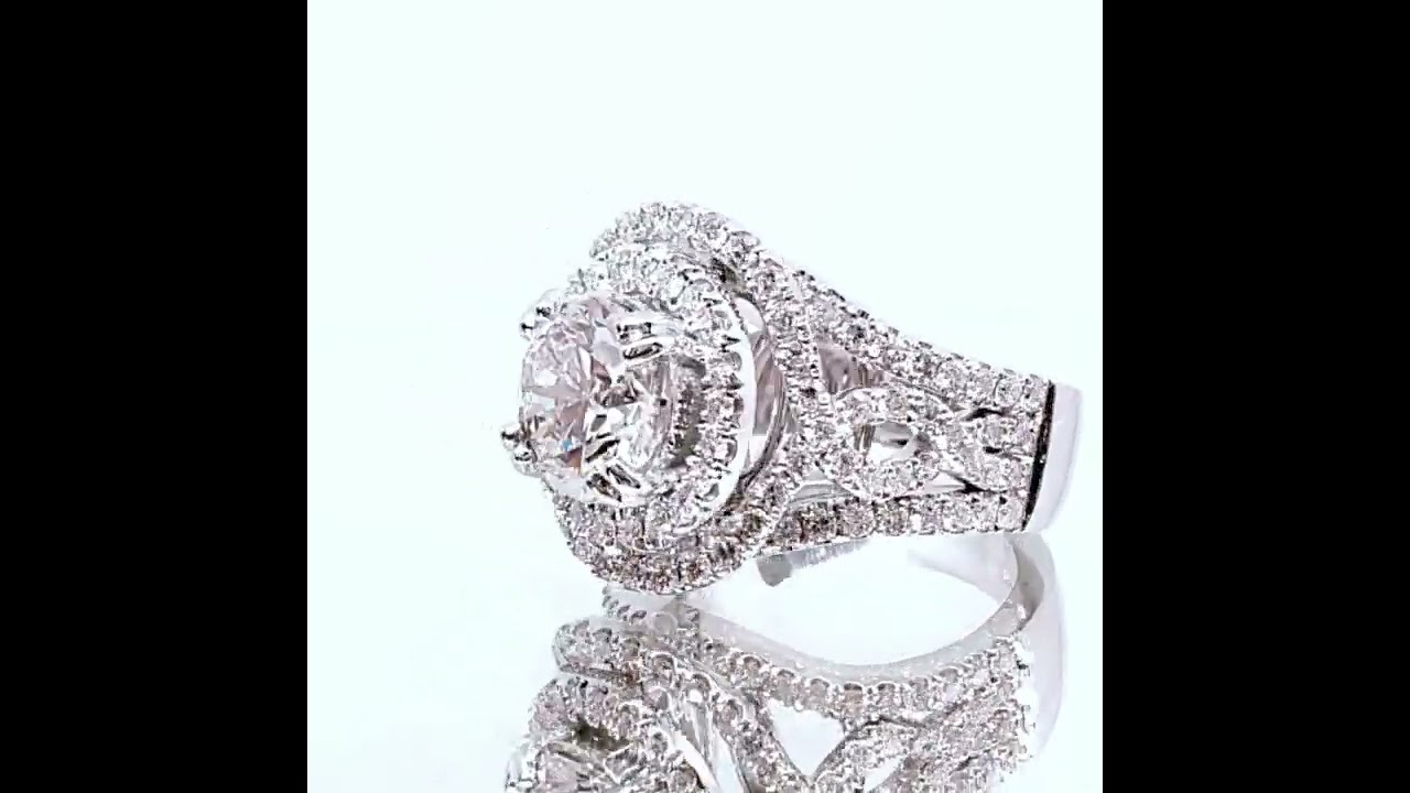 Double halo Diamond engagement ring with a twist.