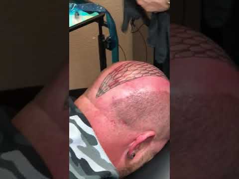 Rick Trip tattooing Ivan Moody of FFDP!