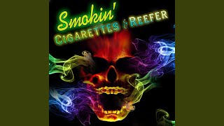 Three Cigarettes In An Ashtray