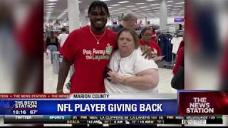 Rookie NFL player pays off layaway debts for 60 Central Florida families