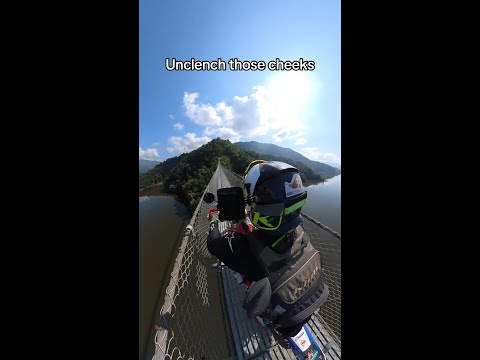 Riding some fun suspension bridges in Nepal 🤪🔥
