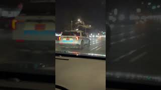 Nassau County police car 818 passing by
