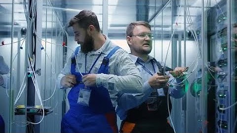 IT Technicians Installing Data Cables Stock Video