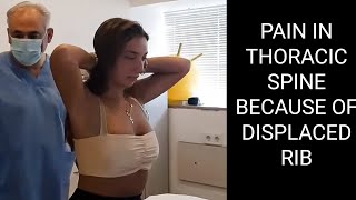 PAIN IN THORACIC SPINE because of DISPLACED RIB chiropractic adjustment chiropractor Evgeni Trigubov