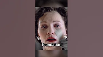 Woman with gray foundation all over her body