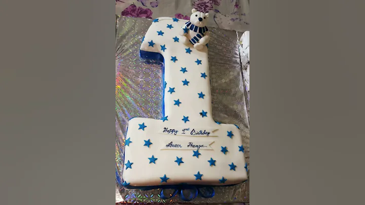 1 num shape teddy bear cake made by Sam's Bakers