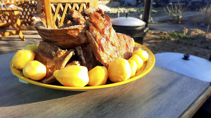 Копчёные рёбра в казане.Smoked ribs in a cauldron