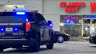 2 people injured in overnight shooting at DeKalb County gas station plaza