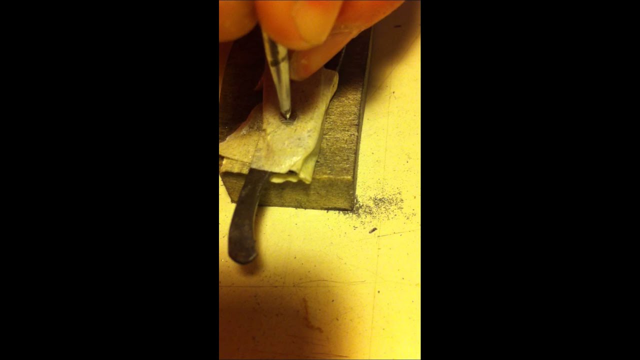 Straight razor pin removal