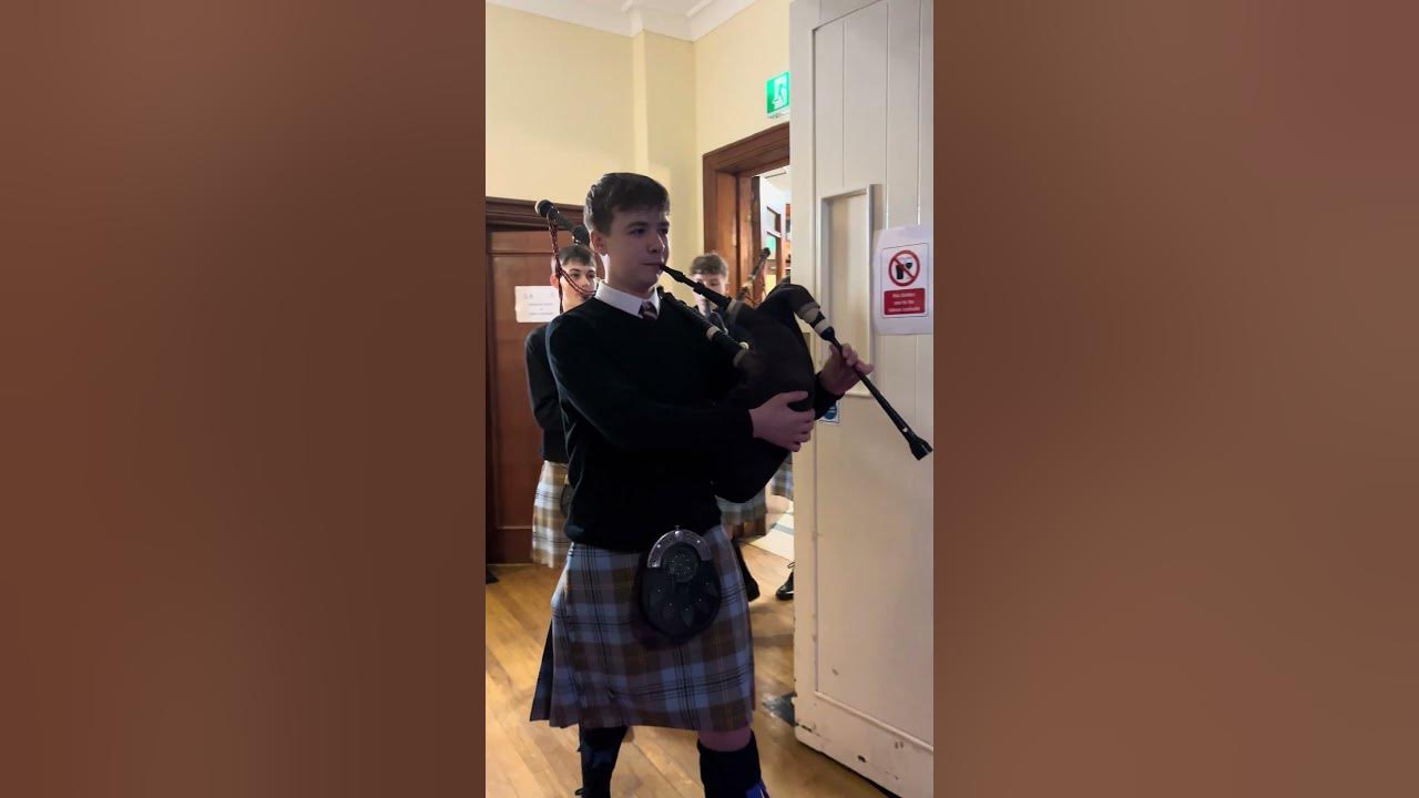 Falkirk Schools Pipe Band playing at the Tinsel Ball 2025