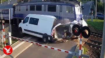 Driver has miracle escape after train obliterates van stuck on level crossing