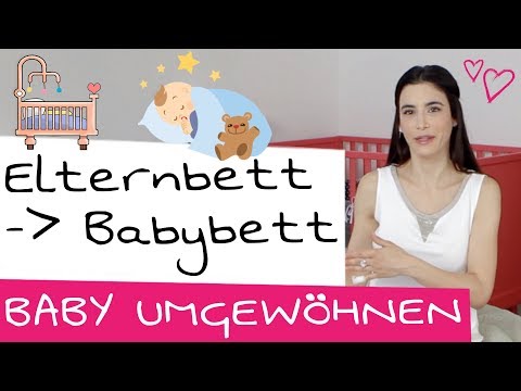 Video: Wie stützt man ein Baby in ein Kinderbett?