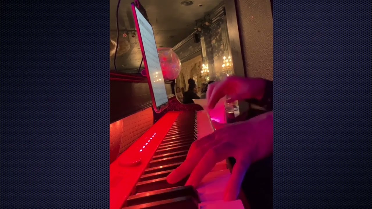 Sy Winnie at the piano