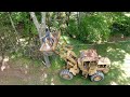 Pulling down a tree with a wheel loader