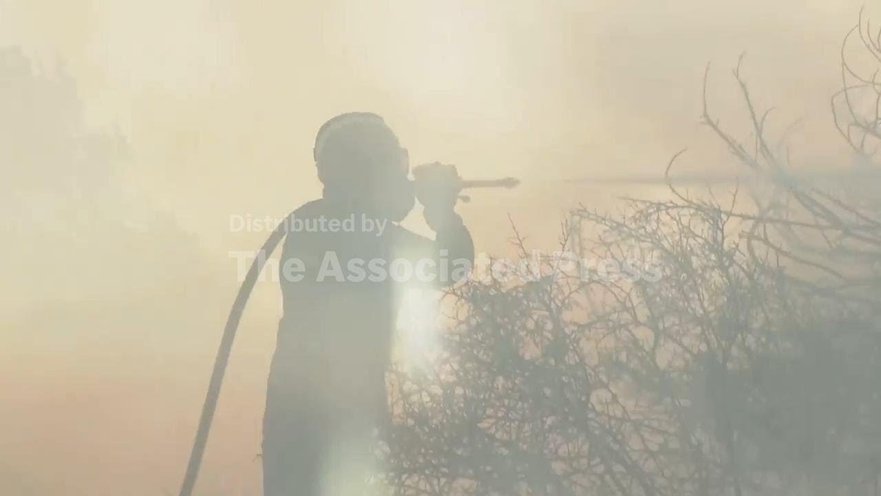 Wildfire threatens homes southeast of Athens as strong winds hamper response