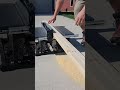 How to rip a board using a table saw when working solo