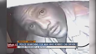 Police seek suspect in taxi robbery