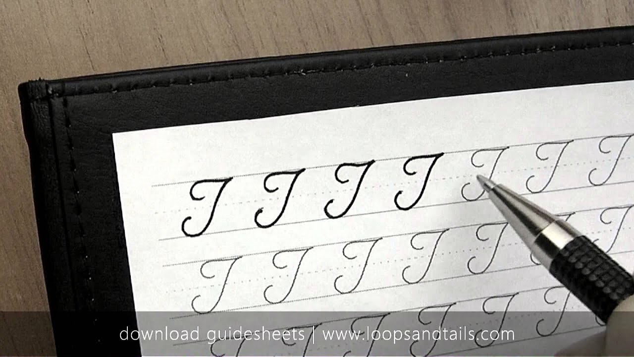 Learn cursive handwriting - Capital T - YouTube