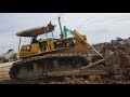 Power of Bulldozer KOMATSU D60P Pushing dirt by skill operator