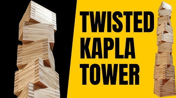 Building a Kapla Cube Tower with a Twist