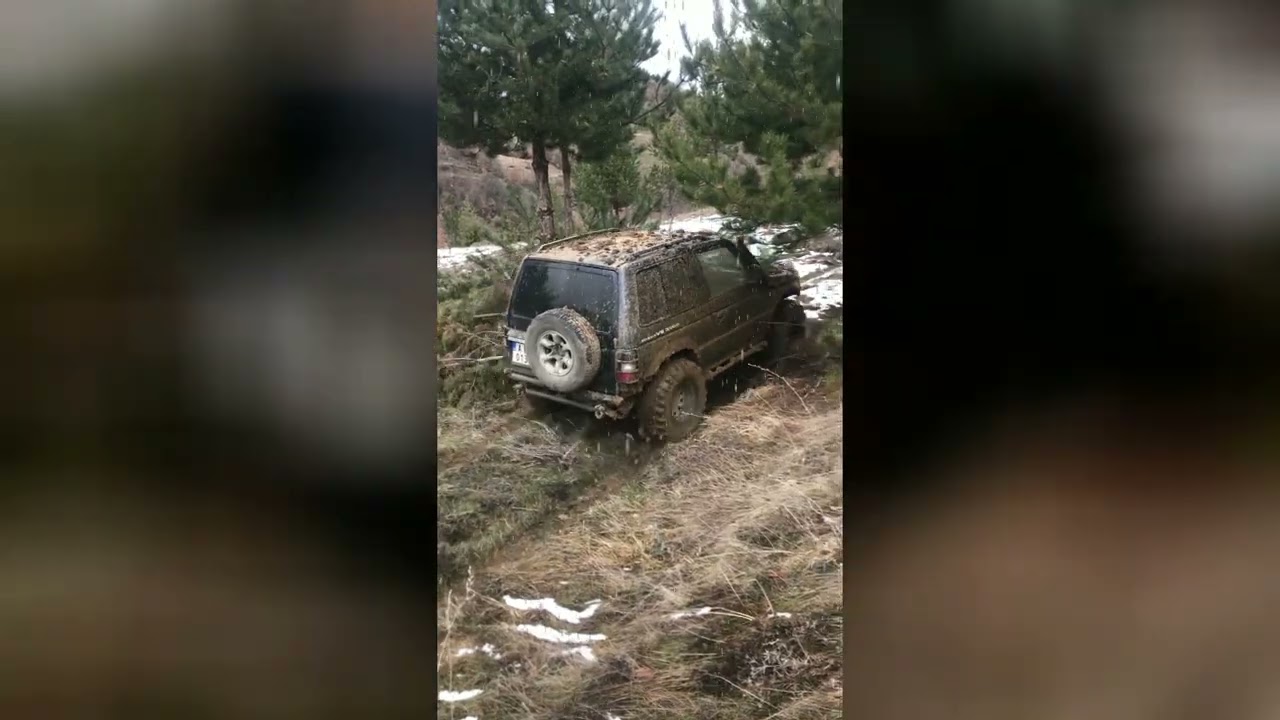 4x4ing in snow with logo