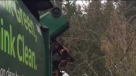 Freightliner M2 Labrie automizer on trash