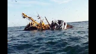 Rescue of shipwrecked fishermen on the high seas - Sinking of fishing boat