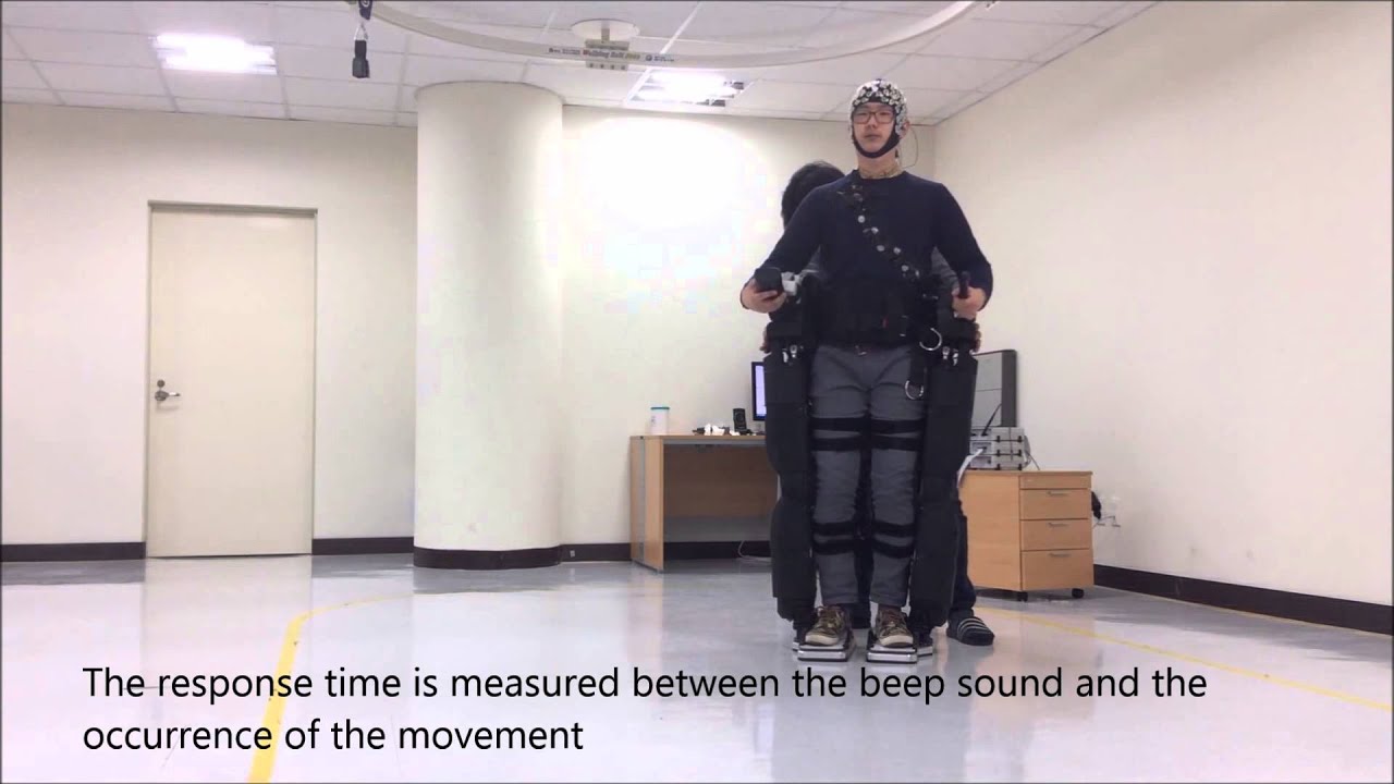 A volunteer operating an exoskeleton using a brain-computer interface ...