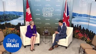 Theresa May meets Prime Minister Canadian Justin Trudeau at G7 summit