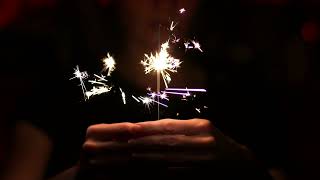 Person Holding Sparkler