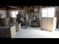 Adam Keeling throwing a two piece giant terracotta flowerpot at Whichford Pottery