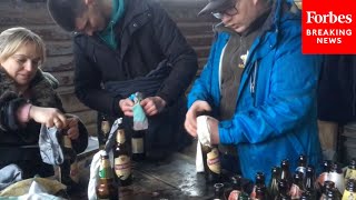 Ukrainians Prepare Molotov Cocktails For Russians