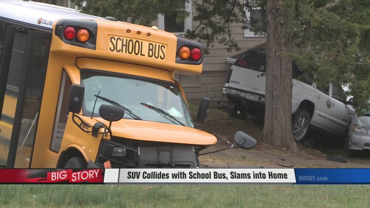 SUV Collides with School Bus, Slams Into House - YouTube