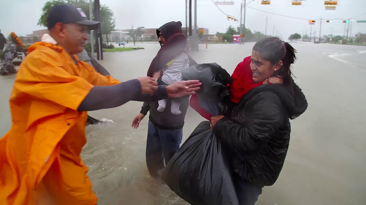 "We had to leave before we got trapped." Volunteers rescue residents in Harris County, Texas.