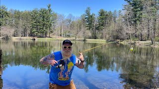 Fishing in a beautiful pond for the biggest bass you’ve ever seen