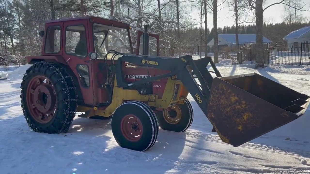 Traktor med lastare Volvo BM 430 med Trima 1100