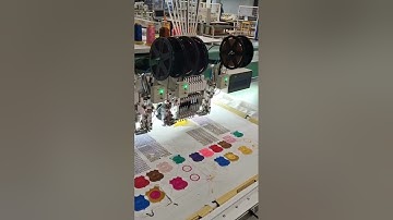 4 Heads 9 colors Embroidery Machine & double sequin devices on side left and side right is testing
