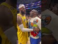 LeBron James daps up Shannon Sharpe after passing Kareem