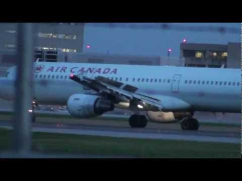 Tropical Storm Sandy Landing Air Canada Airbus A32...