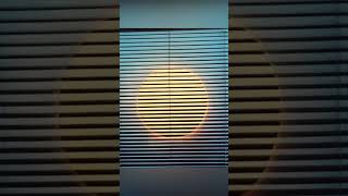 I made a solar eclipse on a mini blind.