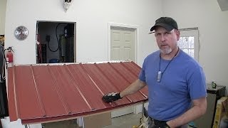 This is the seventh part in a series on how to build a pole barn or pole garage. This video shows how to install the metal roof and 