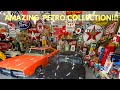 Amazing garage collection of cars vintage signs  gas pumps