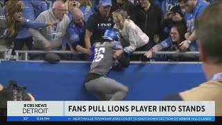 Fans experience "Lions Leap" as Detroit's Jahmyr Gibbs celebrates touchdown in stands screenshot 1