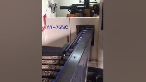 AUTOMATIC CIRCULAR SAWING MACHINE WITH AUTOMATIC LOADING AND OUTPUT SYSTEM