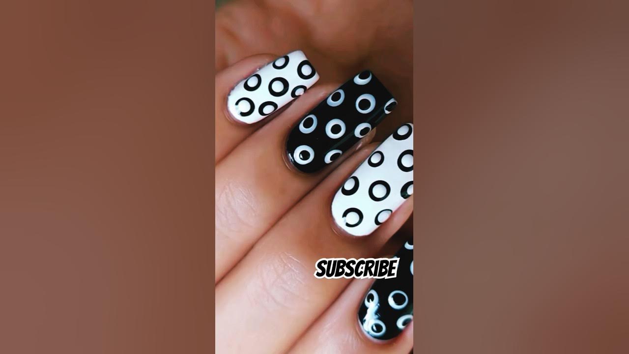 7. Tribal Black and White Nail Design - wide 4