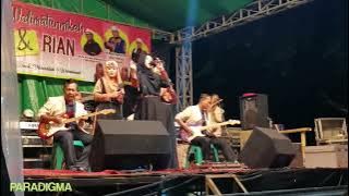 Paradigma - Almanar Vocl. Hj. Heny Syam