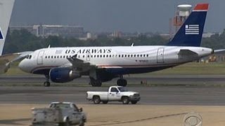 Feds sue to block US Airways, American Airlines merger