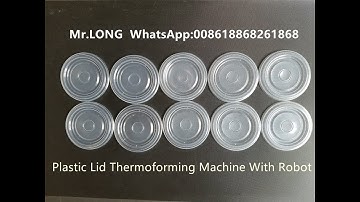 Plastic Thermoforming Machine Making Lids With Robot Stacker