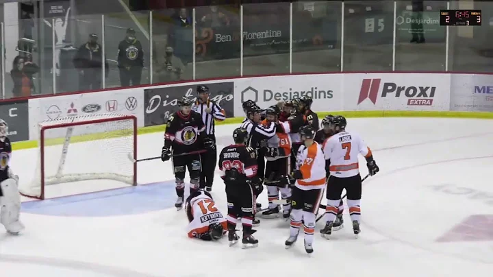 Goalie Domenic Graham punches Francis Beauvillier ...