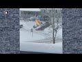 Man cleans snow off driveway with flamethrower (VIDEO)